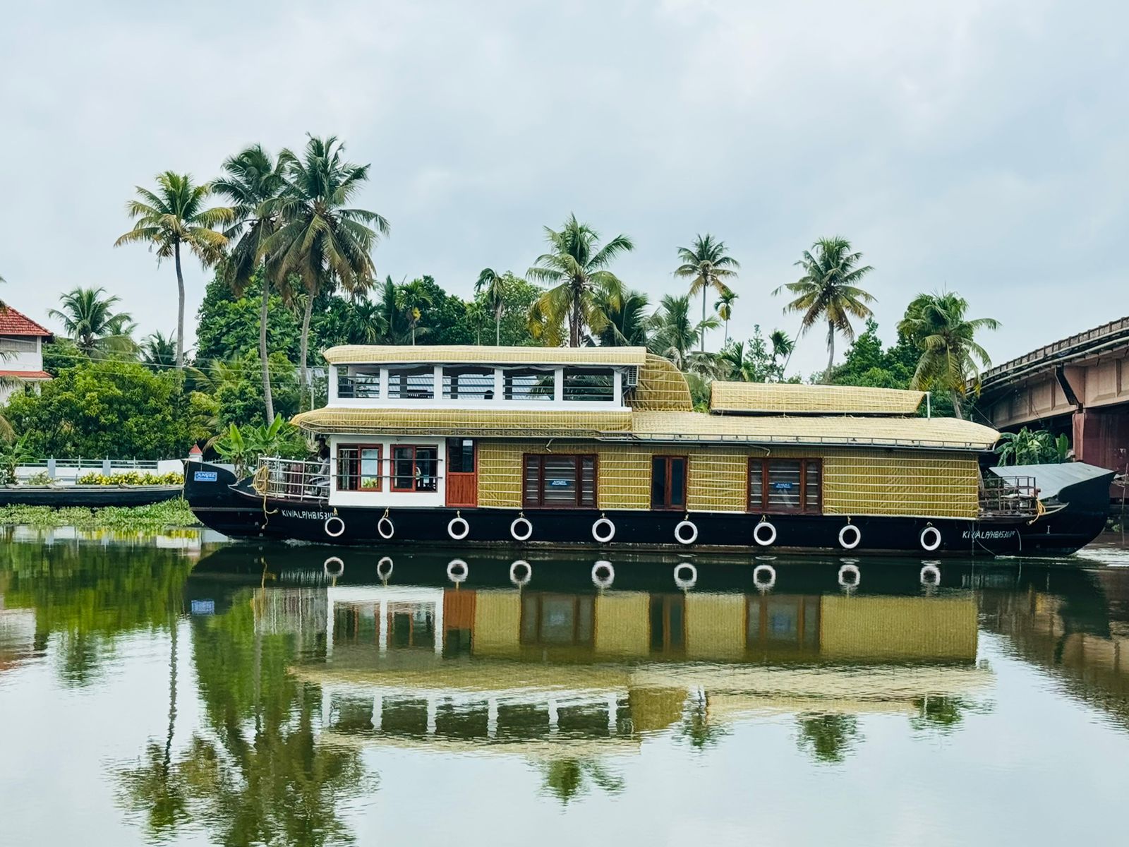 Angel Houseboats vessel cruising along the backwaters